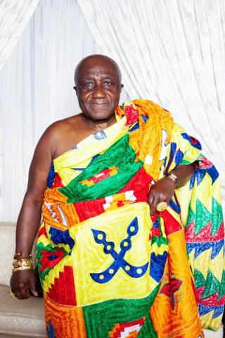 Asante oral historian in traditional dress