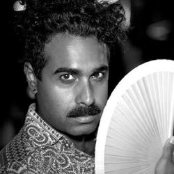 profile picture of Kareem Khubchandani, holding a fan