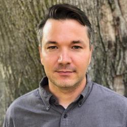 profile picture of Alex Blanchette standing in front of a tree