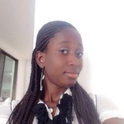 Mavis Osei Antwi profile photo iside a white building