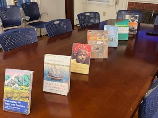 conference table with books on it